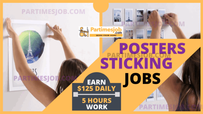 pasting posters on walls